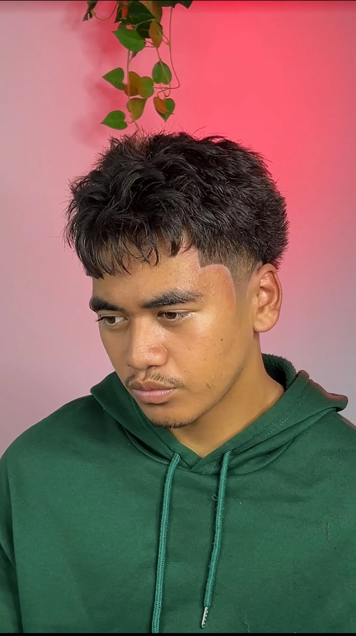 Textured crop cut over a low taper, with the fringe left soft across the forehead.